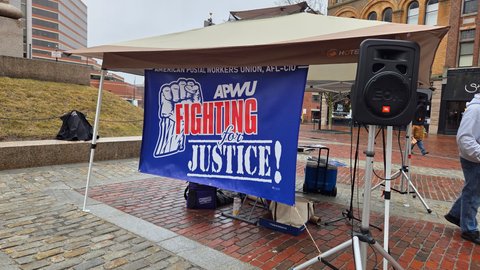 Rain shelter and banner